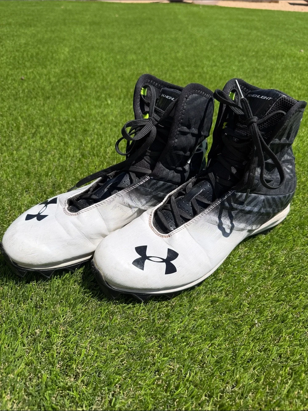 Under Armour Men’s White and Black High-Top Athletic Cleats
